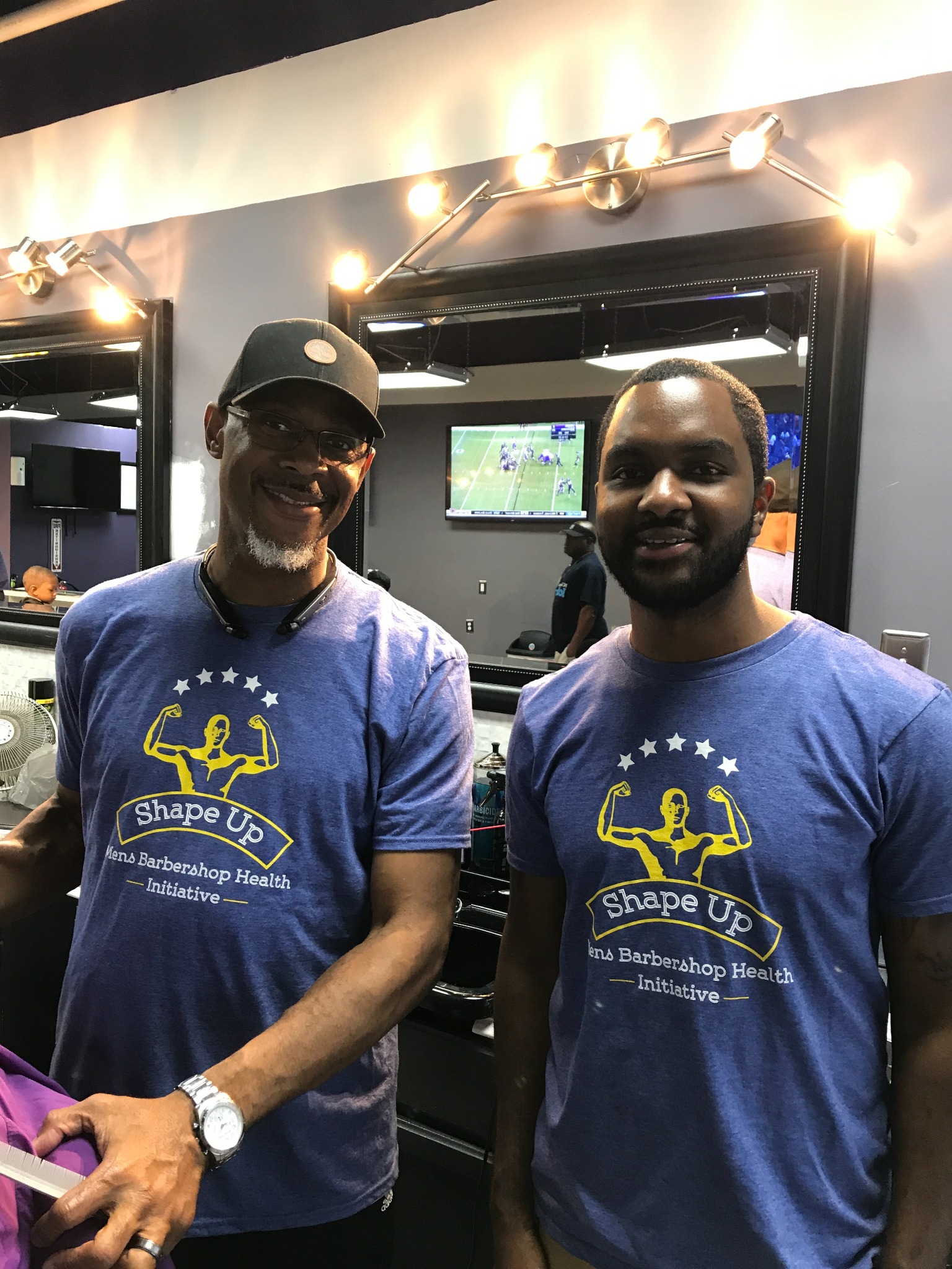 At a men's barbershop health initiative